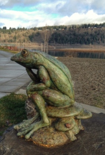 Whimsy on the waterfront. Froggy sculpture placed where two pathways meet. Artist: Ralph Trethewey